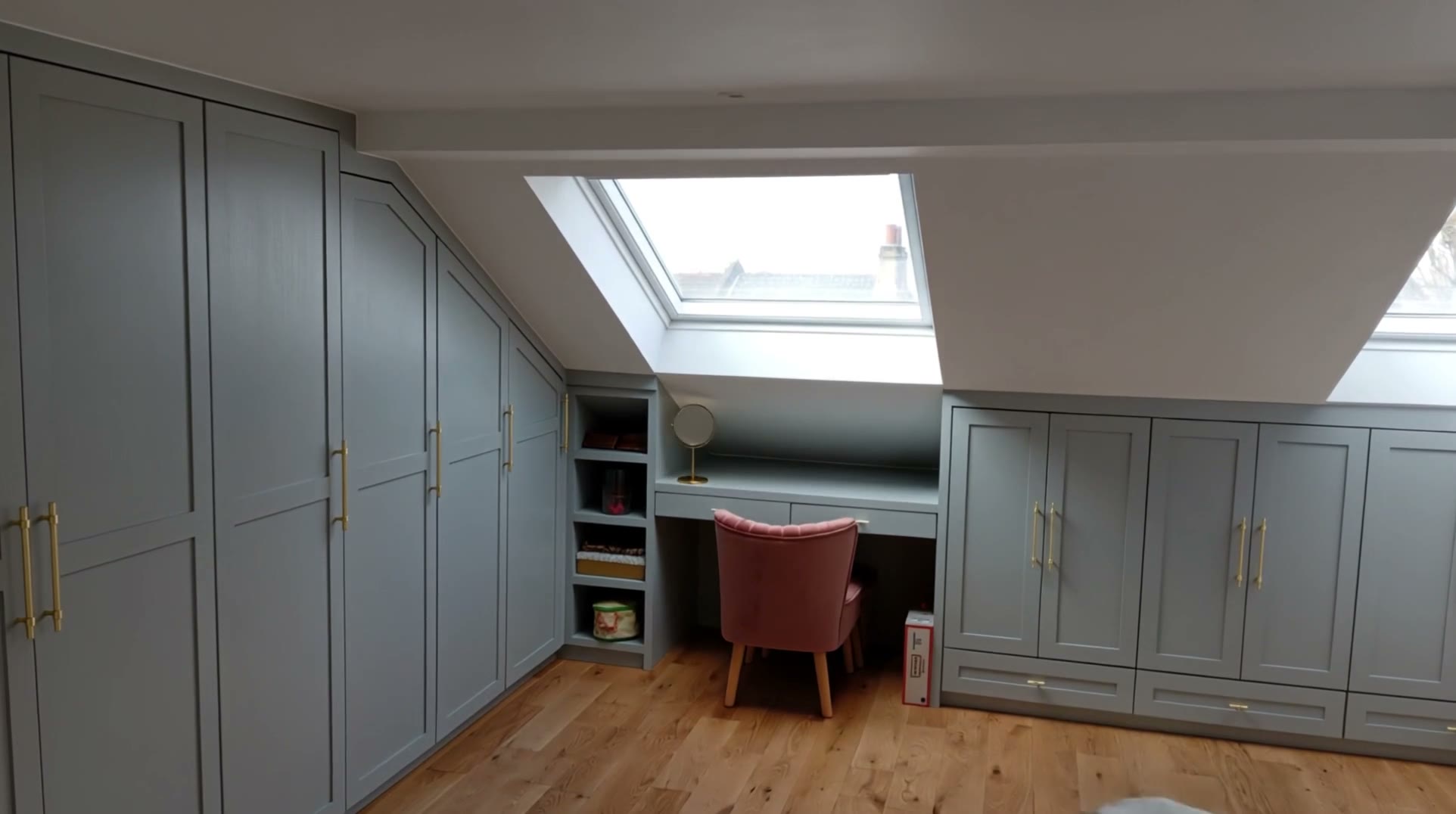 A finished sage green fitted wardrobe