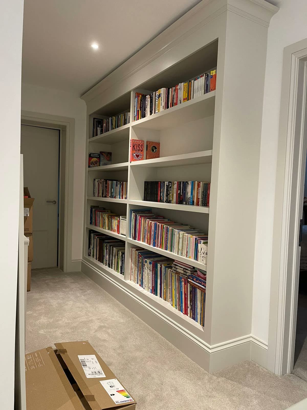 Built-in bookcase wall with crown moulding